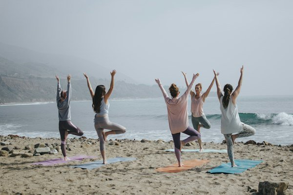 Group holding tree pose together