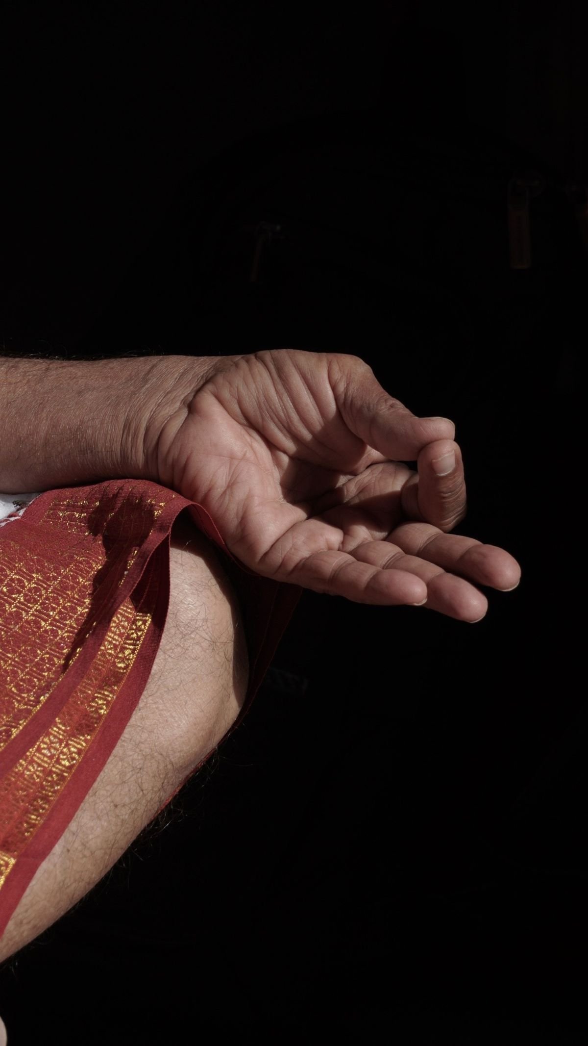 Hands in gyan mudra during a pranayama class