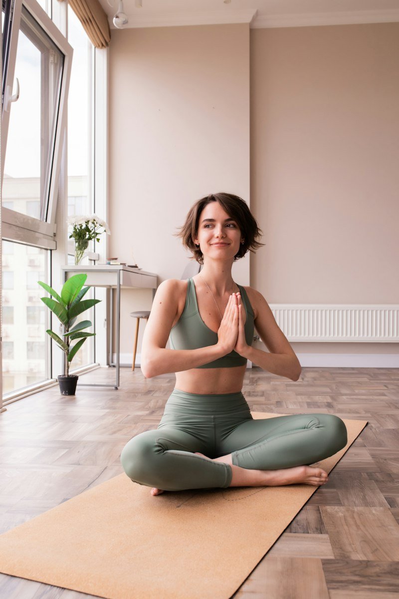 Student in a guided seated pose